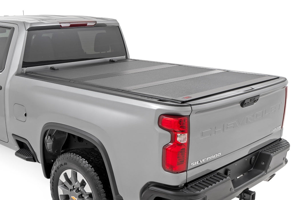 Hard Tri-Fold Flip Up Bed Cover | 6'9" Bed | Chevy/GMC  Silverado/Sierra 2500HD/3500HD (20-24)