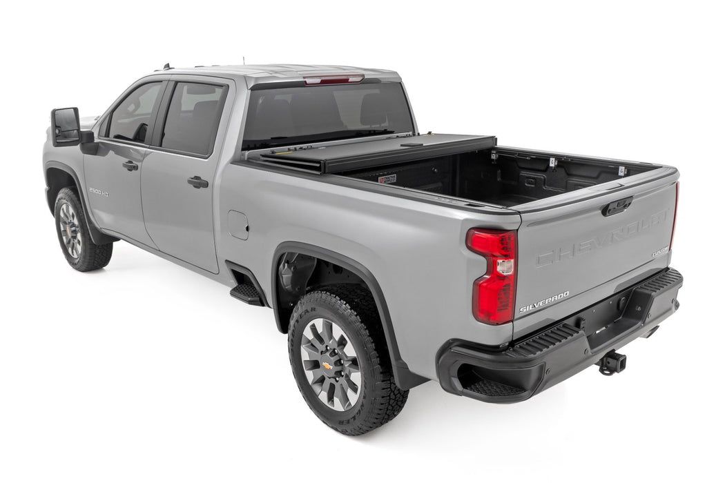 Hard Tri-Fold Flip Up Bed Cover | 6'9" Bed | Chevy/GMC  Silverado/Sierra 2500HD/3500HD (20-24)