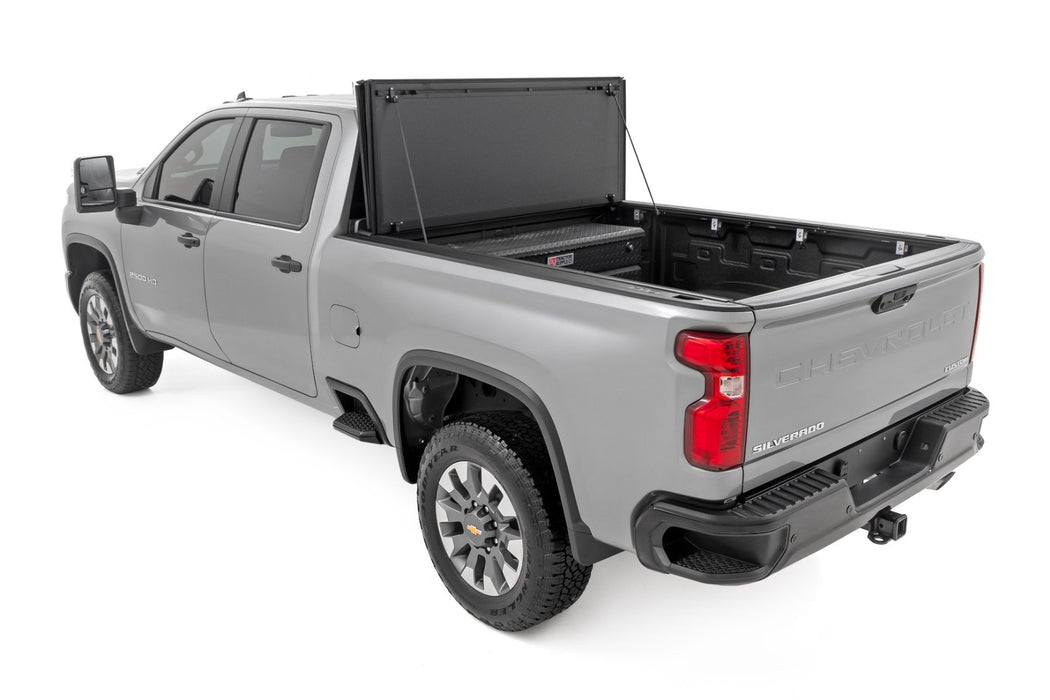 Hard Tri-Fold Flip Up Bed Cover | 6'9" Bed | Chevy/GMC  Silverado/Sierra 2500HD/3500HD (20-24)