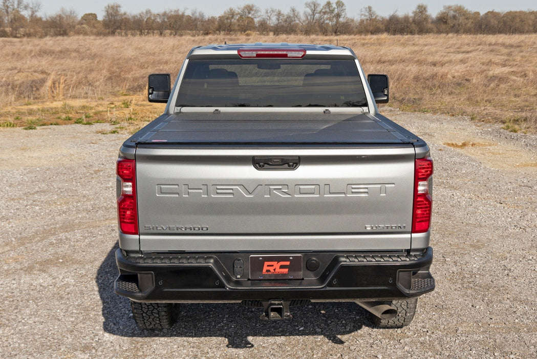 Hard Tri-Fold Flip Up Bed Cover | 6'9" Bed | Chevy/GMC  Silverado/Sierra 2500HD/3500HD (20-24)